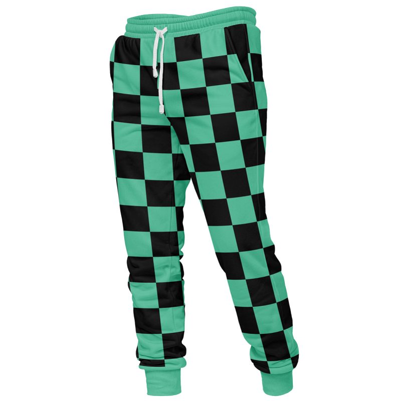 Tanjiro Kamado Demon Slayer Sweatpants feature a green and black checkered pattern, elastic waistband with white drawstring, and fitted ankle cuffs. The bold geometric design covers the entire garment.