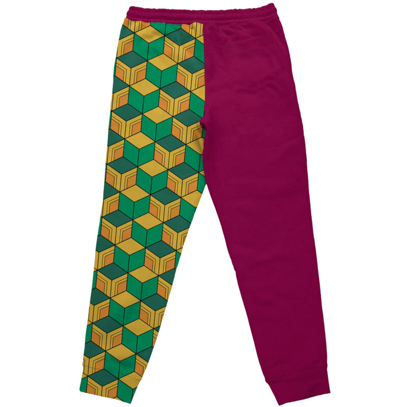 The Giyu Tomioka Demon Slayer Sweatpants feature one leg in solid magenta and the other adorned with a bold yellow, green, and teal geometric cube pattern.