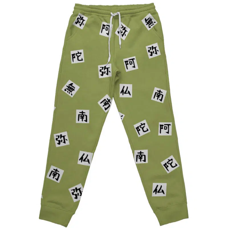 Light green Gyomei Himejima Demon Slayer sweatpants with white drawstrings, decorated with black and white patches featuring East Asian characters printed throughout the fabric.
