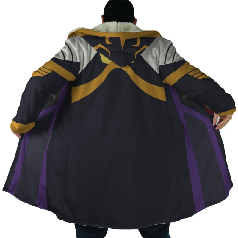 A person faces away from the camera, holding open the Momonga Overlord Dream Cloak Coat to reveal its interior lining. The long black coat features gold and purple designs, a fur-lined hood, and detailed stylized patterns on the back.