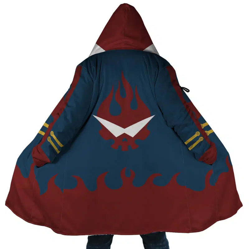 A person wears the Simon Tengen Toppa Gurren Lagann Dream Cloak Coat: dark blue with red flames at the bottom, yellow sleeve stripes, and a large stylized skull with sunglasses and flames on the back.
