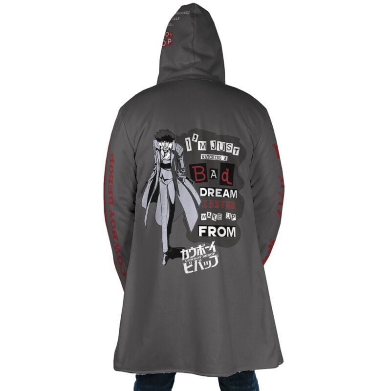 A person wears the Spiegel Spike 2 Dream Cowboy Bebop Dream Cloak Coat, a dark gray hooded coat with an anime character, “I’m just living in a bad dream I never wake up from,” Japanese text, and Cowboy Bebop on the sleeve.