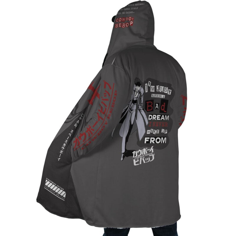 A person wears the Spiegel Spike 2 Dream Cowboy Bebop Dream Cloak Coat, a dark gray hooded jacket featuring anime graphics, Japanese text, bold English phrases, and a large Spike Spiegel image on the back with stylized designs.