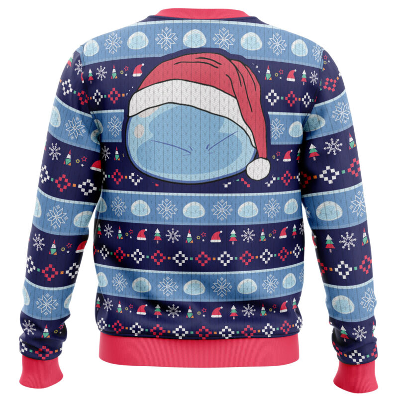 Celebrate the holidays with the Slimy Christmas That Time I Got Reincarnated as a Slime Sweater, featuring a blue, round character in a Santa hat on the back, red trim, and festive snowflakes, trees, and geometric patterns.