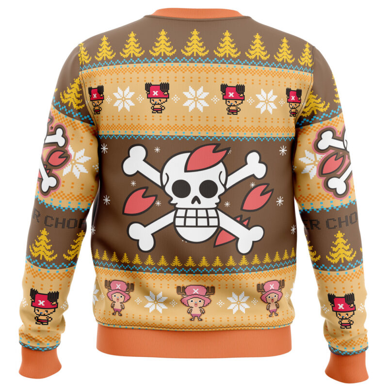 The Christmas Tony Chopper One Piece Ugly Christmas Sweater features a large skull with crossbones and red antlers, surrounded by yellow trees, snowflakes, and cartoon reindeer in pink hats on a brown and orange background.