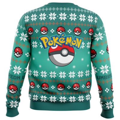 The Christmas Umbreon Pokemon Ugly Christmas Sweater is green with the Pokémon logo and Poké Ball graphic on the back, plus white snowflakes and rows of Poké Balls in a festive holiday pattern.