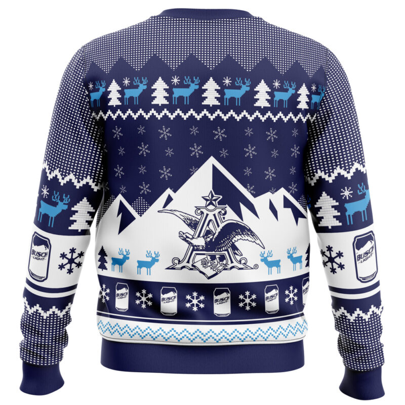 The Show Me Your Busch Ugly Christmas Sweater features a festive mountain scene with trees, blue and white reindeer, an eagle emblem on the back, snowflakes, cans, and the Busch logo—all in blue and white tones.