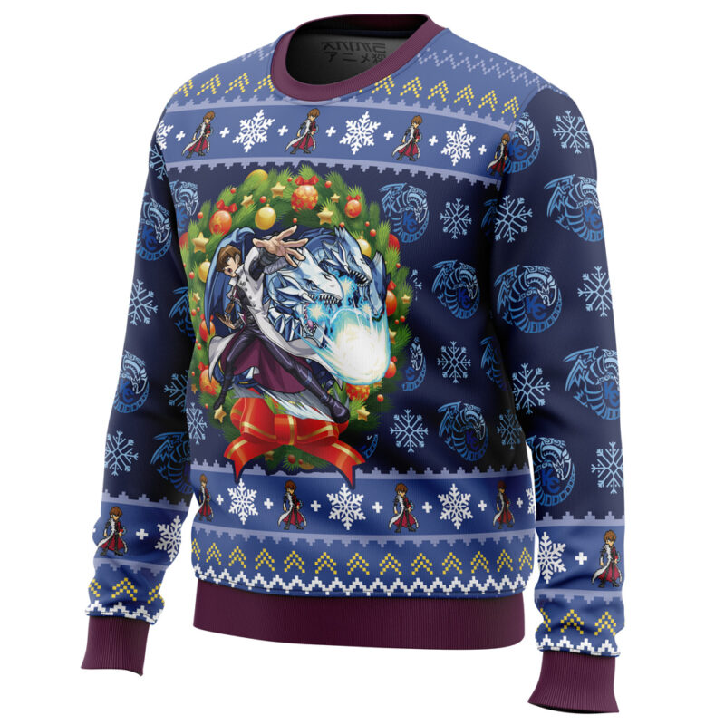 The Kaiba Blue-Eyes White Dragon Christmas Yugioh Ugly Christmas Sweater features blue snowflakes, small character designs, and an anime-style Kaiba with Blue-Eyes White Dragon, framed by a festive wreath and red ribbon.