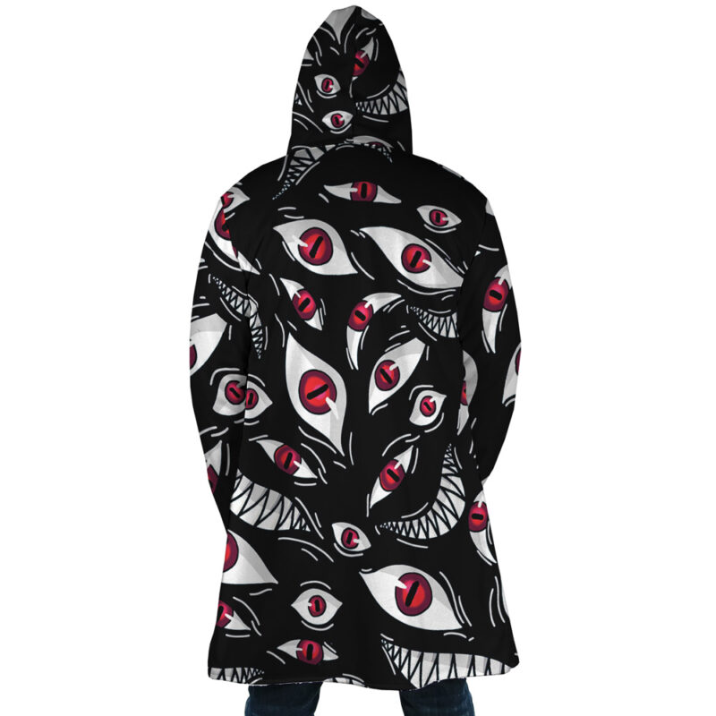 A person wearing a Pride Fullmetal Alchemist Dream Cloak Coat with red eyes.
