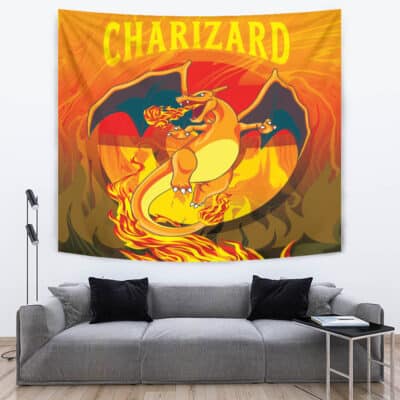 The Trippy Charizard Pokemon Tapestry, showing Charizard breathing fire with wings outstretched and "Charizard" in yellow at the top, hangs above a gray couch with black pillows in a modern living room.