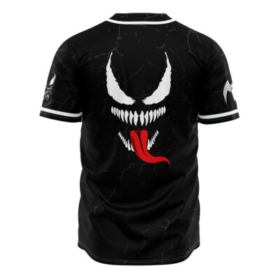 The Venom Marvel Baseball Jersey features a black short-sleeve design with a bold white monstrous face, sharp teeth, and a red tongue on the back. White details and a spider emblem accent the sleeves.
