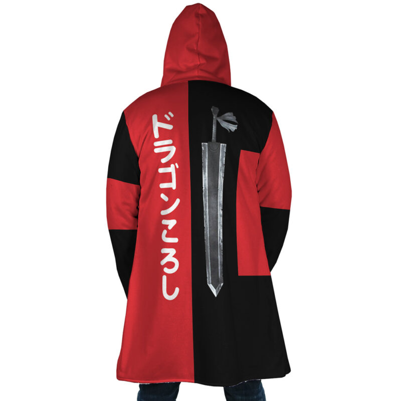 A person wearing the Guts Dragonslayer Berserk Dream Cloak Coat, featuring a red and black hood, a large sword graphic, and vertical white Japanese text on the back, is seen facing away from the camera.