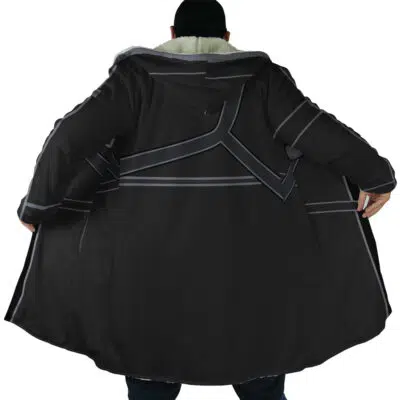 A person faces away, spreading open a Kirito Sword Art Online Dream Cloak Coat to reveal its silver-grey detailing and white lining on the back.
