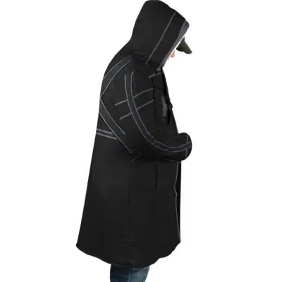 A person wears the Kirito Sword Art Online Dream Cloak Coat—a black hooded trench coat with gray stripes—over a cap and blue jeans, standing in profile against a white background.