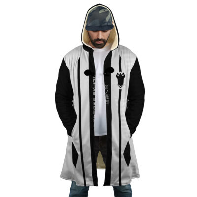 A person wearing the Gotei 13 4th Division Captain Retsu Unohana Bleach Dream Cloak Coat, a long, hooded black and white coat with decorative stripes and a crown emblem on the chest, stands with hands in pockets against a plain white background.