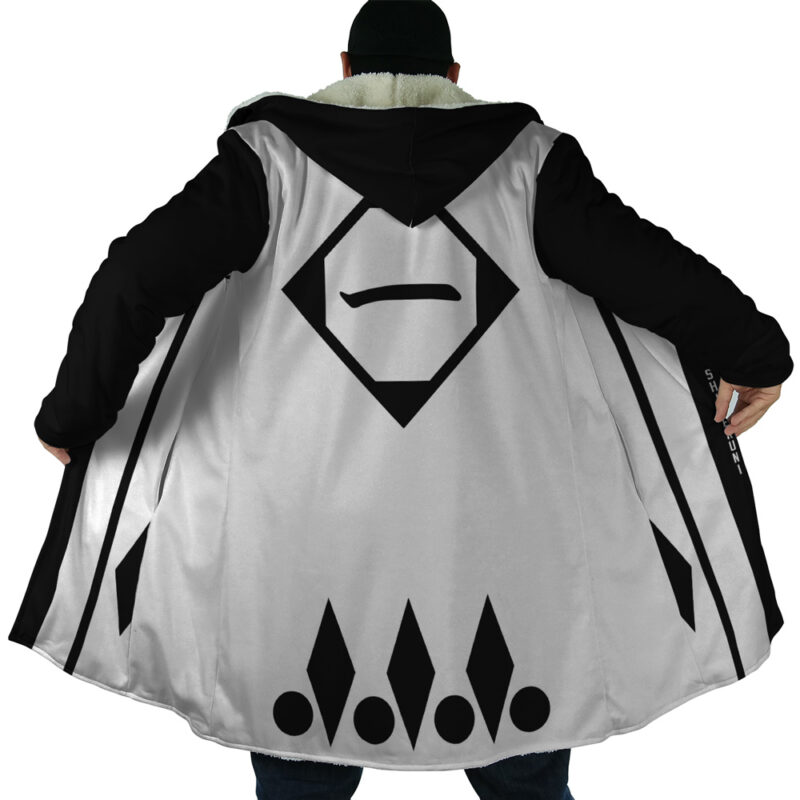 A person wearing the 1st Division Captain Commander Yamamoto Genryusai Shigekuni Gotei 13 Bleach Dream Cloak Coat, featuring black and white colors with bold geometric symbols on the back, stands with arms spread to showcase the design.