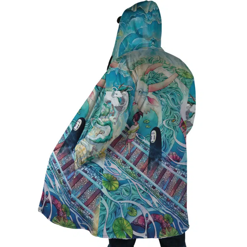 Someone wears the Mythical Spirited Away Studio Ghibli Dream Cloak Coat, a colorful hooded cloak with an intricate design featuring characters, waves, plants, and a bridge in vivid blues, greens, and pinks.