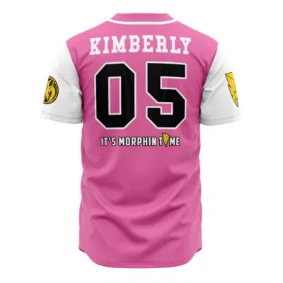 The Pink Pterodactyls Kimberly Hart Power Rangers Baseball Jersey features pink and white colors, KIMBERLY and 05 on the back, ITS MORPHIN TIME, and two yellow badge logos on the sleeves.