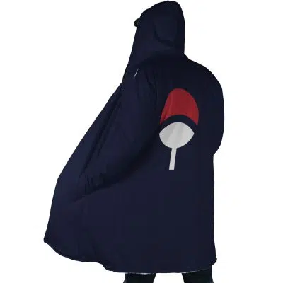 A person wearing the Uchiha Clan Sharingan Shippuden Dream Cloak Coat, featuring a dark blue hood and a red and white fan symbol on the back, inspired by the Naruto anime, stands facing away from the camera.