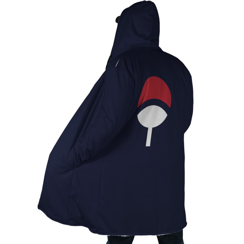 A person wearing the Uchiha Clan Sharingan Shippuden Dream Cloak Coat, featuring a dark blue hood and a red and white fan symbol on the back, inspired by the Naruto anime, stands facing away from the camera.