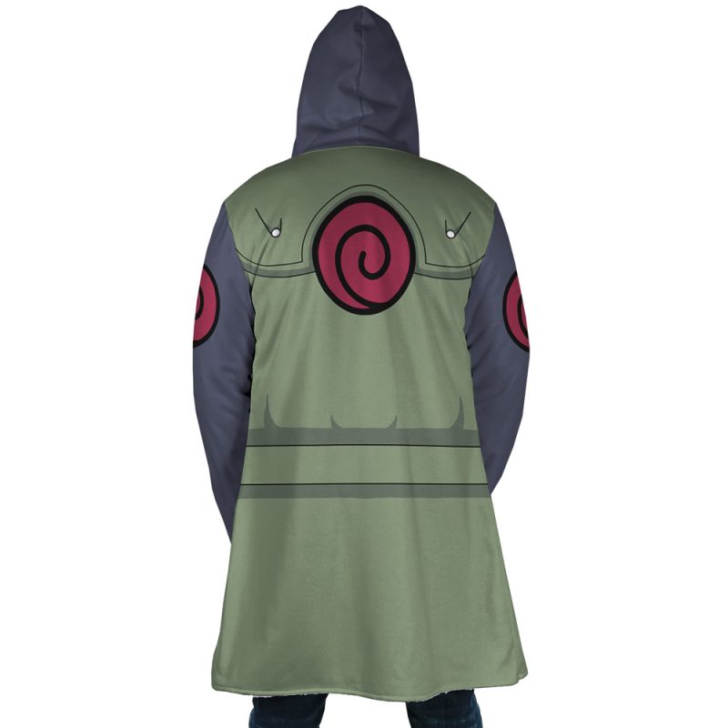 A person is seen from behind wearing the Kakashi Hatake Shippuden Dream Cloak Coat, a hooded anime-style green and gray coat with red spiral emblems on the back and sleeves.