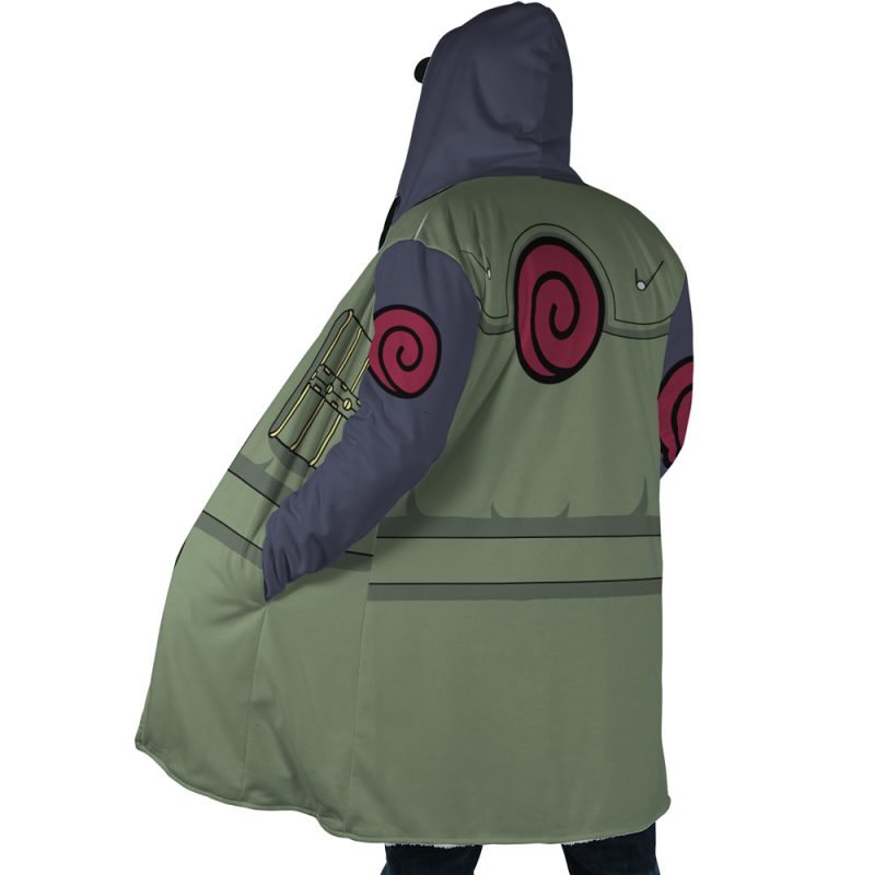 A person wearing the Kakashi Hatake Shippuden Dream Cloak Coat, a hooded poncho featuring green and gray colors, red swirl emblems on the sleeves, large pockets, and shown from the back.