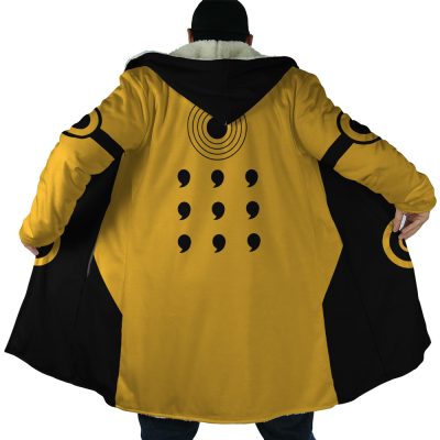 A person facing away wears the Six Paths Sage Mode Shippuden Dream Cloak Coat, a long yellow and black coat with circular sleeve patterns, nine comma marks in three rows on the back, a black hood, and fur collar.