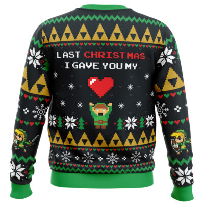 Celebrate the holidays with the Link To My Heart Zelda Ugly Christmas Sweater, featuring a pixelated hero holding a red heart, snowflakes, geometric patterns, and the phrase Last Christmas I gave you my above the character.