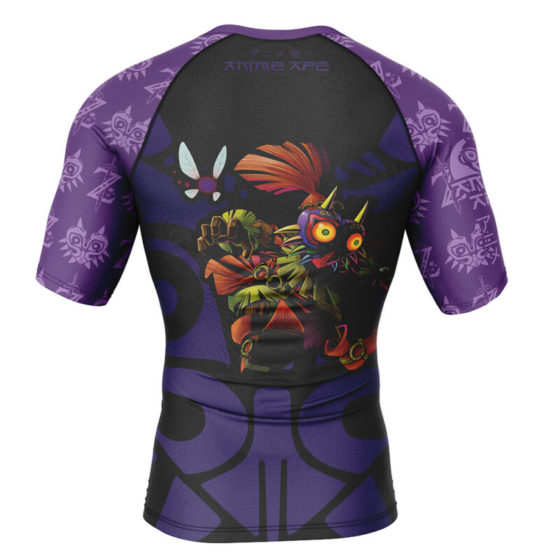 The Majora’s Mask Zelda Short Sleeve Rash Guard Compression Shirt features Skull Kid on the back, Majora’s Mask patterns, and a fairy on the sleeves and shoulders in striking purple and black.