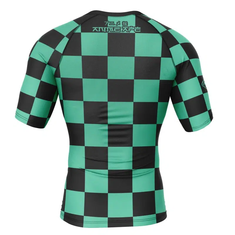 The Tanjiro Kamado Demon Slayer Short Sleeve Rash Guard Compression Shirt features a fitted design, black and green checkered pattern, Japanese-style text at the top, and is shown from the back.