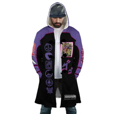 A man stands with hands in his pockets, looking down, wearing the Yare Yare Daze Jojo's Bizarre Adventure Dream Cloak Coat—a hooded, long coat featuring purple and black colors, graphic anime-inspired designs, Japanese characters, and a colorful chest patch.