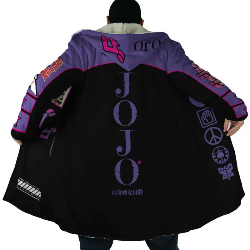 A person stands with their back to the camera, wearing the Yare Yare Daze Jojo's Bizarre Adventure Dream Cloak Coat—a long black and purple garment with bold JOJO text and anime-inspired symbols.