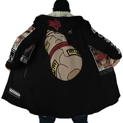 A person faces away, holding open the Gaara Shippuden Dream Cloak Coat, which features anime-style graphics such as a large robotic fist on the back and colorful manga panels lining the inside.