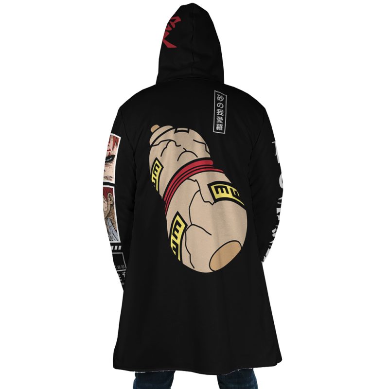 Wearing the Gaara Shippuden Dream Cloak Coat—a long black hooded coat with anime-inspired designs, a large sand gourd illustration on the back, and manga-style images with Japanese text on the sleeves.