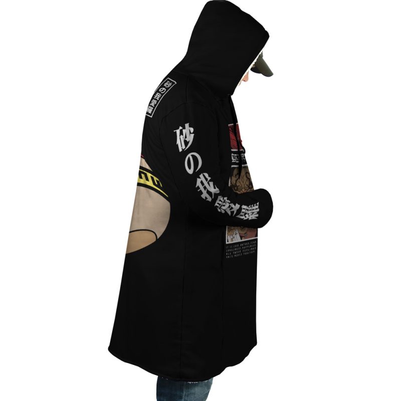 A person wearing the Gaara Shippuden Dream Cloak Coat—black with Japanese characters and anime-style graphics on the side and sleeve—stands in profile against a white background.