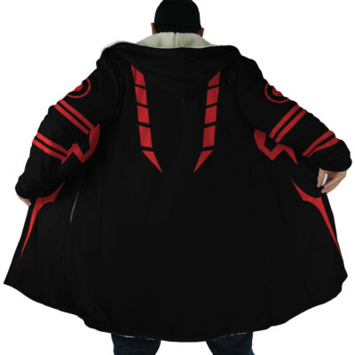 A person stands with their back to the camera, wearing the Sukuna Jujutsu Kaisen Dream Cloak Coat featuring bold red geometric patterns and white fur trim around the hood.