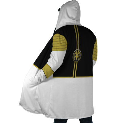 A person is shown from behind wearing the White Ranger Mighty Morphin Power Rangers Dream Cloak Coat, which features black, white, and gold colors with a symbol on the back and is inspired by the White Ranger.