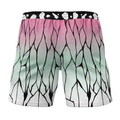 The Shinobu Kocho V2 Demon Slayer Gym Shorts feature a gradient design that transitions from pink at the top to light green and white at the bottom, completed with a bold black branching pattern throughout.