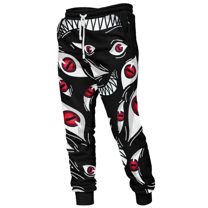 The Pride Fullmetal Alchemist Custom Joggers Sweatpants feature black fabric with a bold graphic of cartoonish faces with sharp teeth and red eyes, plus black waistband and cuffs accented by white drawstrings.
