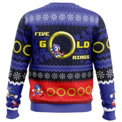 The 5 Gold Rings Sonic the Hedgehog Ugly Christmas Sweater features Sonic in running poses, gold rings, snowflakes, and "Five Gold Rings" in pixelated font, with blue, red, yellow, and white colors for a festive look.