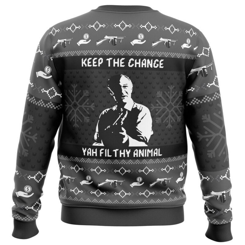 The Keep the Change Yah Filthy Animal Home Alone Ugly Christmas Sweater is black and gray, features snowflakes, toy guns, candy, a pointing man, and displays "KEEP THE CHANGE YAH FILTHY ANIMAL" across the chest and back.