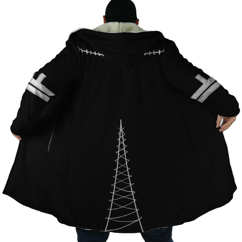 A person stands with their back to the camera, wearing Dabi's Coat from My Hero Academia—a long black Dream Cloak featuring silver stitched designs on the back and sleeves, with a bold silver tower-like pattern down the center.