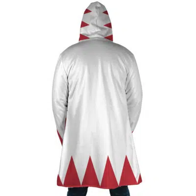 A person stands facing away, wearing the White Mage Final Fantasy Dream Cloak Coat—a long white hooded coat featuring red triangular patterns along the bottom hem and hood edge.