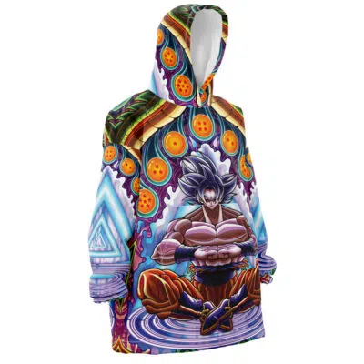 The Trippy Ultra Instinct Goku Dragon Ball Z Snug Oversized Blanket Hoodie features a vibrant anime design of Goku meditating, surrounded by seven orange dragon balls and mystical, colorful patterns on a symmetrical background.