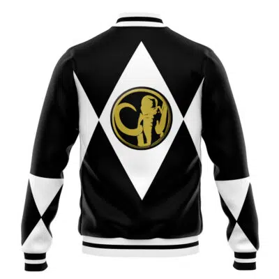 The Black Ranger Mighty Morphin Power Rangers Varsity Jacket features a black and white design with diamond patterns and a gold circular emblem of a helmeted figure with a stylized tail on the back.