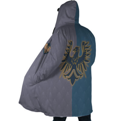 A person wears the Hogwarts Legacy Ravenclaw Harry Potter Dream Cloak Coat, featuring a large, gold-outlined phoenix on the back and split gray and blue shades, while facing away from the camera.
