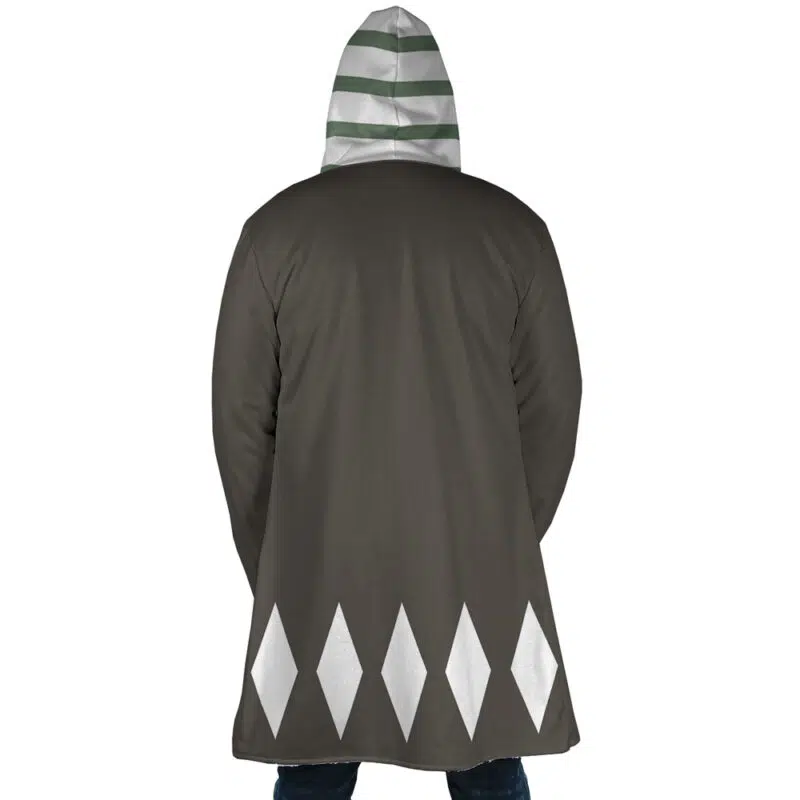 A person is seen from the back wearing the Kisuke Urahara Bleach Dream Cloak Coat, featuring a dark color with white diamond shapes at the bottom and a hood with horizontal white and green stripes.