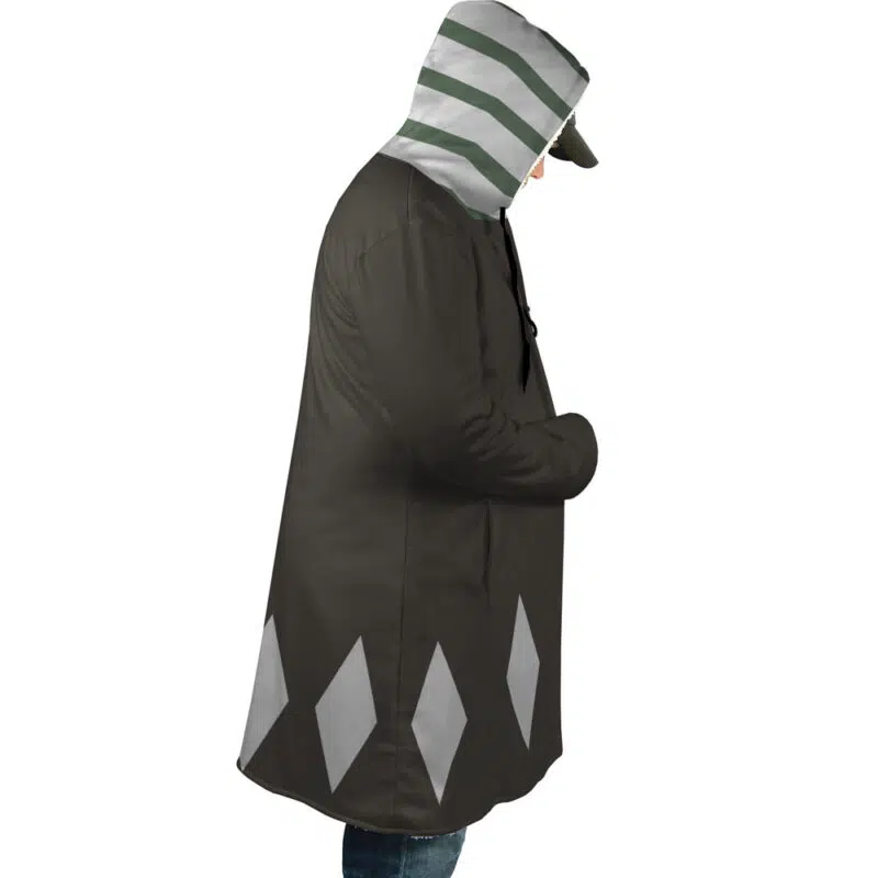 Wearing the Kisuke Urahara Bleach Dream Cloak Coat, a person stands in profile facing right, hands in pockets, displaying green and white stripes with a diamond pattern along the bottom.