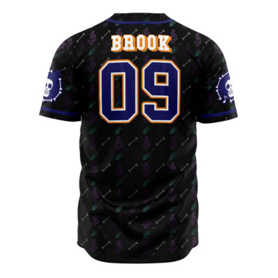 The Straw Hats Brook One Piece Baseball Jersey is a black short-sleeve jersey with “BROOK” in bold yellow letters, the number “09” on the back, purple and green symbols, and white skull-and-crossbones on the sleeves.