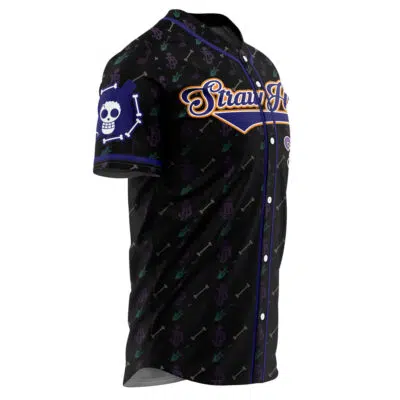 The Straw Hats Brook One Piece Baseball Jersey is black with purple and green sword and music note patterns, an orange Straw Hat logo on the chest, and a white skull and crossbones on the left sleeve.